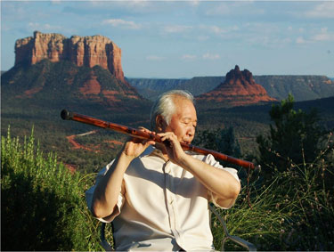 Ilchi Lee Playing Flute in Sedona
