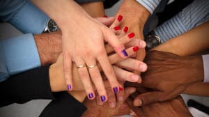 group of multicultural hands together