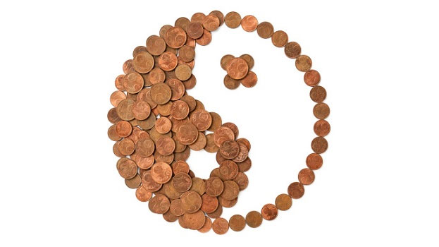 yin yang symbol made with pennies