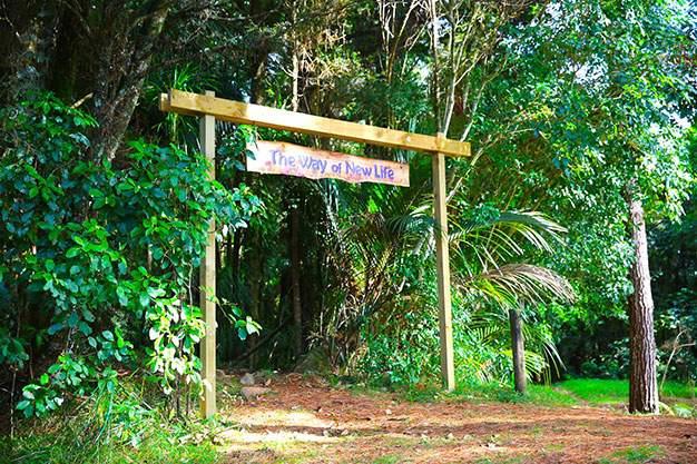 entry to trail at Earth Village in New Zealand