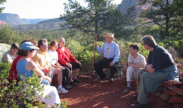 Ilchi Lee speaking with students in the beauty of Sedona, Arizona