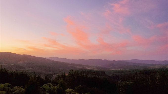 sunrise over small hills in New Zealand