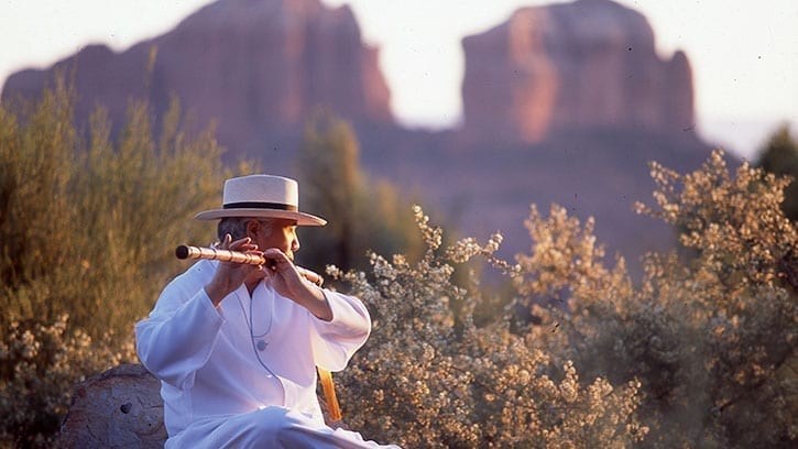 Ilchi Lee playing flute in Sedona, Arizona
