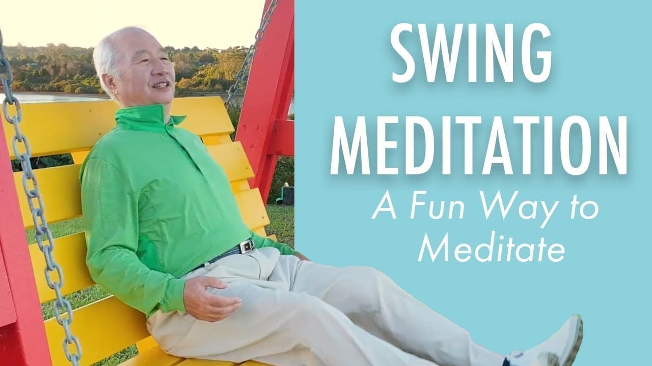 Ilchi Lee meditating on a swing