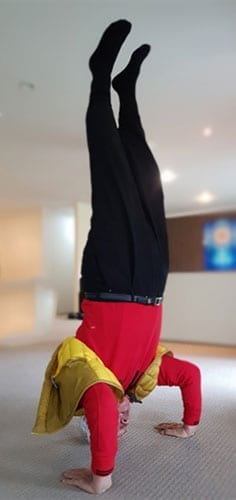 Ilchi Lee doing a handstand