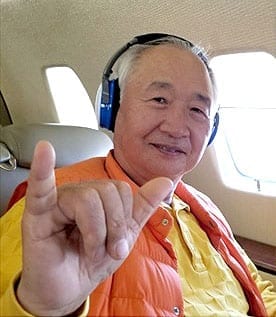 Ilchi Lee on a plane