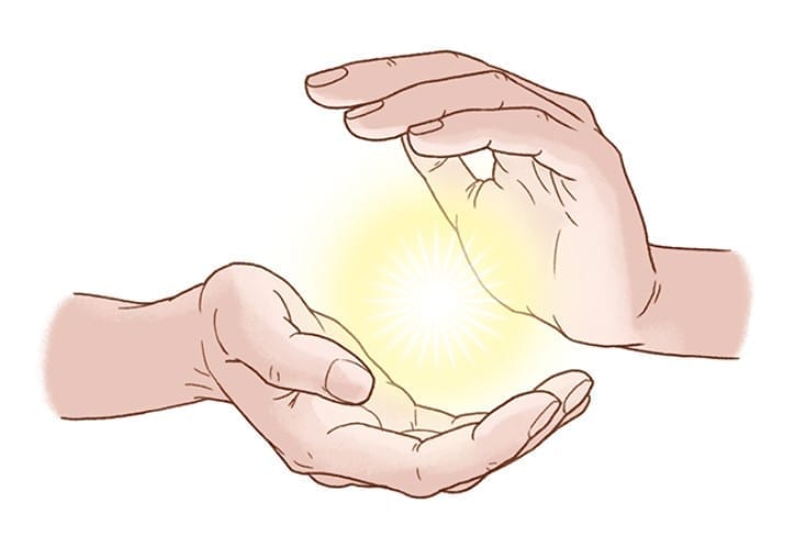 hands surrounding an energy ball
