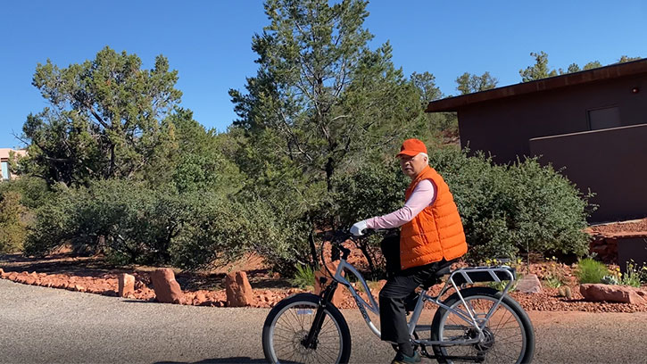 Ilchi Lee riding a bicycle in Sedona